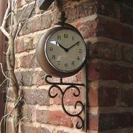 Antique rust outdoor clock and thermometer