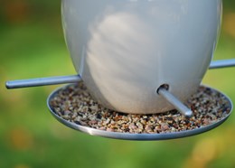 Ceramic egg seed feeder