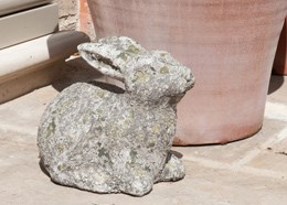 Decorative aged stone rabbit