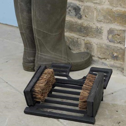 Cast iron boot brush and jack