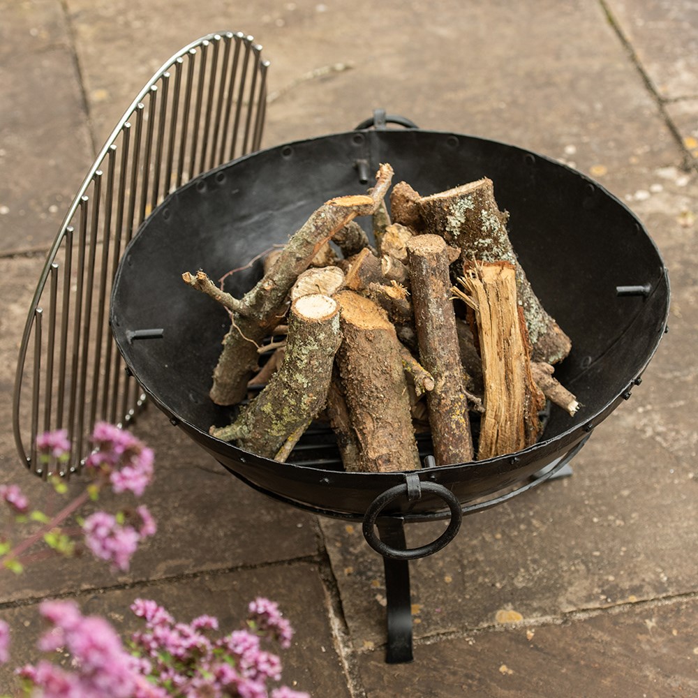Small Indian fire pit bowl with stainless steel cooking grill