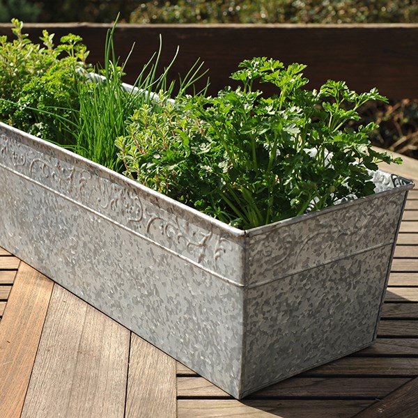 Embossed galvanised metal window trough