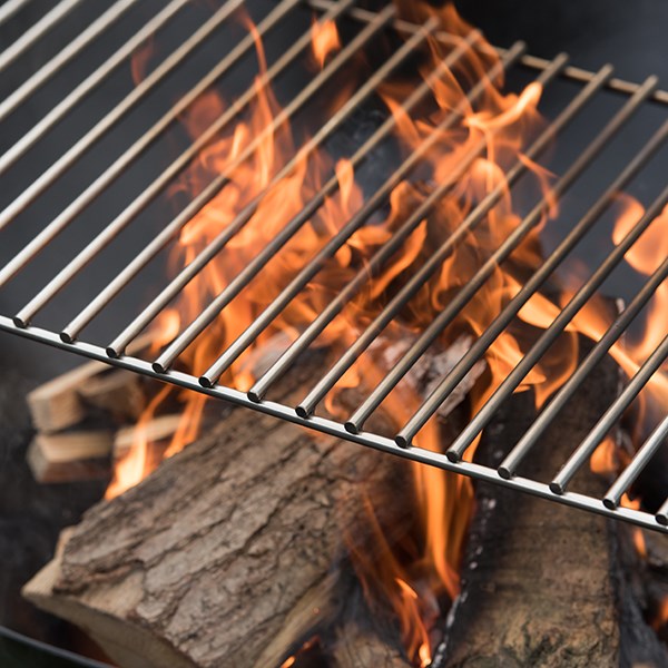 Iron disc fire pit with stainless steel cooking grill