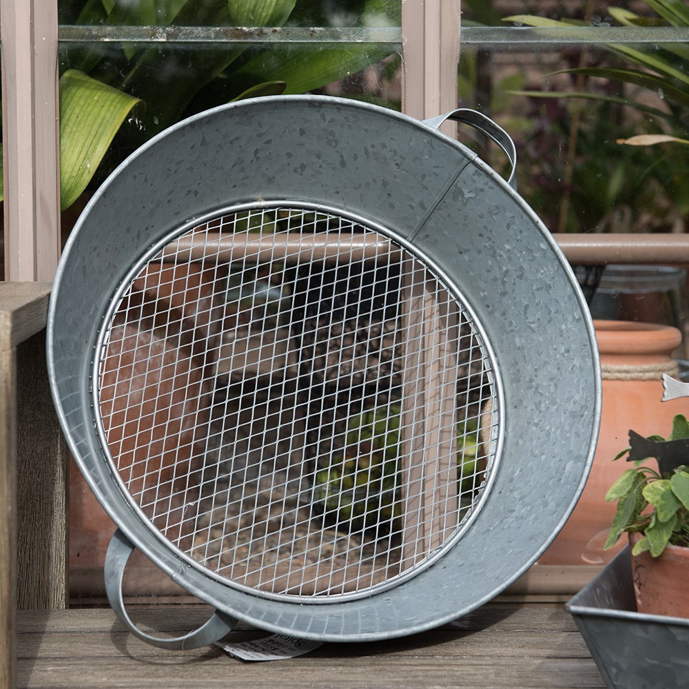 Galvanised metal round soil sieve