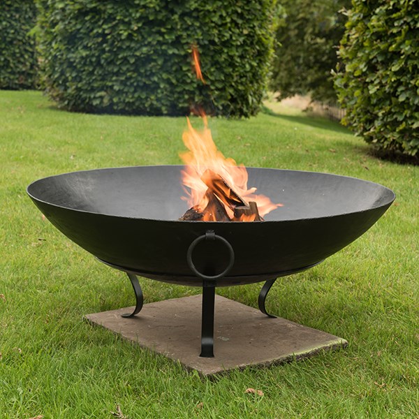 Iron disc fire pit bowl with tripod base