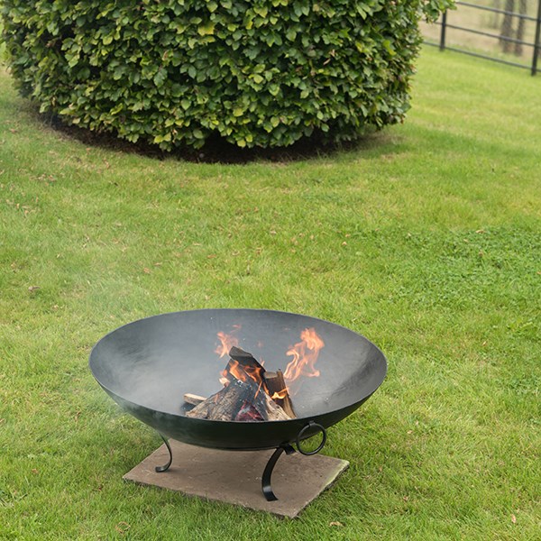 Iron disc fire pit bowl with tripod base