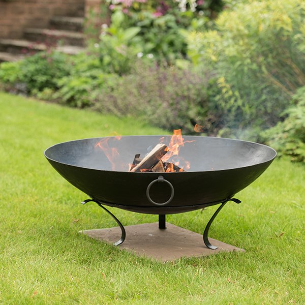 Iron disc fire pit bowl with tripod base