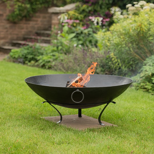 Iron disc fire pit bowl with tripod base