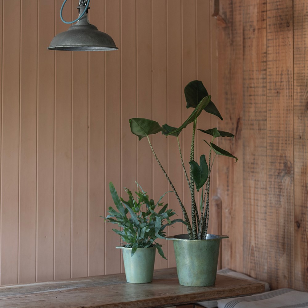 Cast aluminium pot cover with verdigris patina