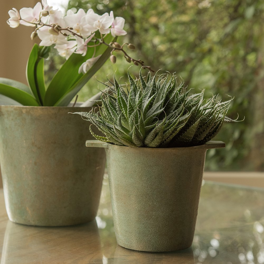 Cast aluminium pot cover with verdigris patina