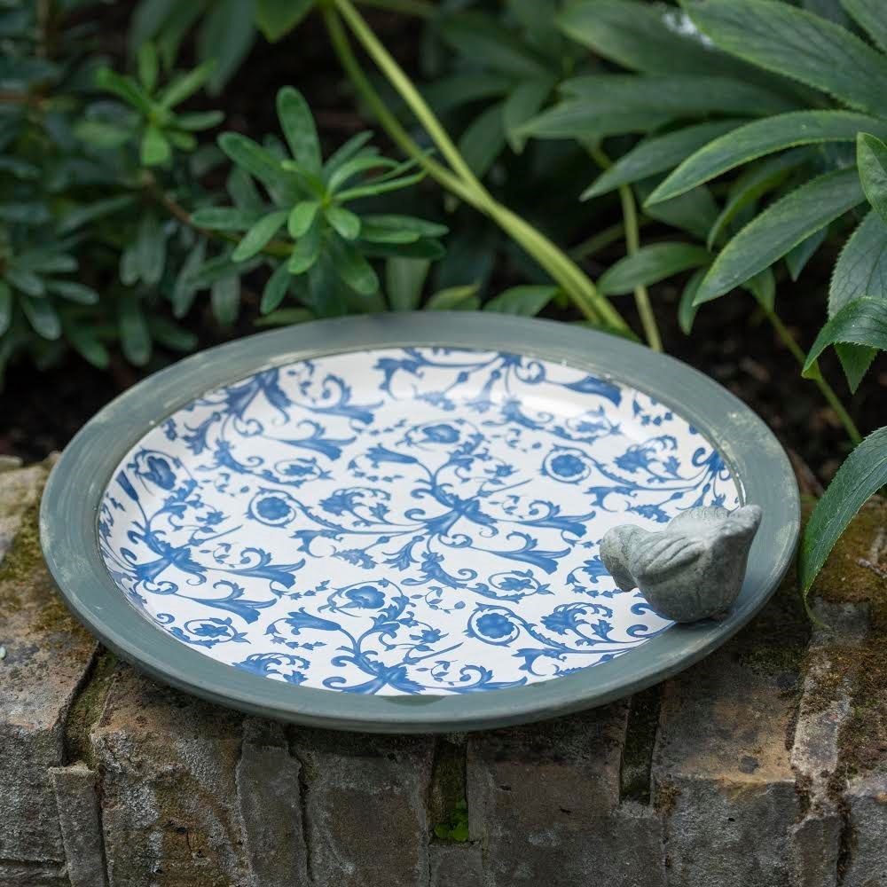 Aged ceramic bird bath