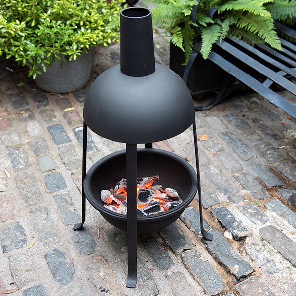 Hooded jiko fire pit with fire starter dome