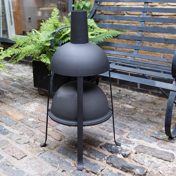 Hooded jiko fire pit with fire starter dome