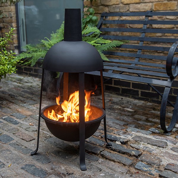 Hooded jiko fire pit with fire starter dome
