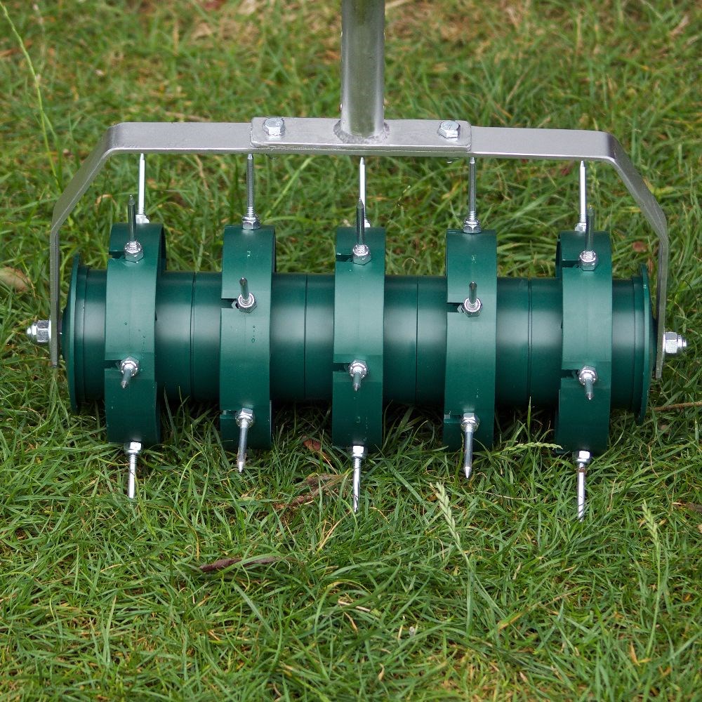 Rolling lawn aerator
