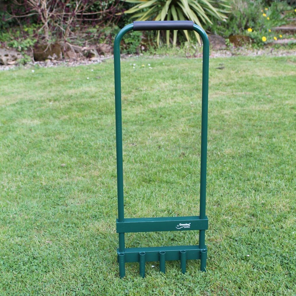 Hollow tine lawn aerator