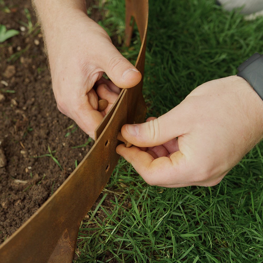 Corten steel tree ring edging - rust