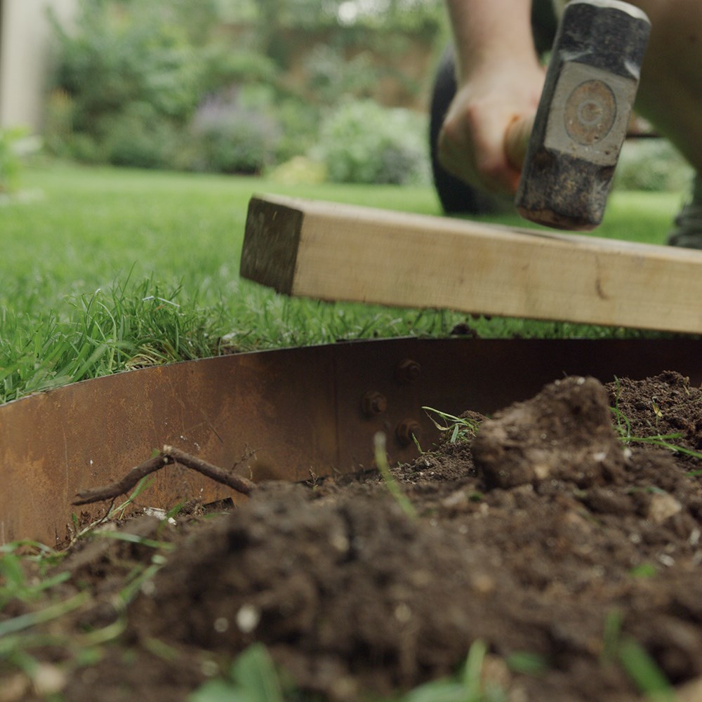 Corten steel tree ring edging - rust