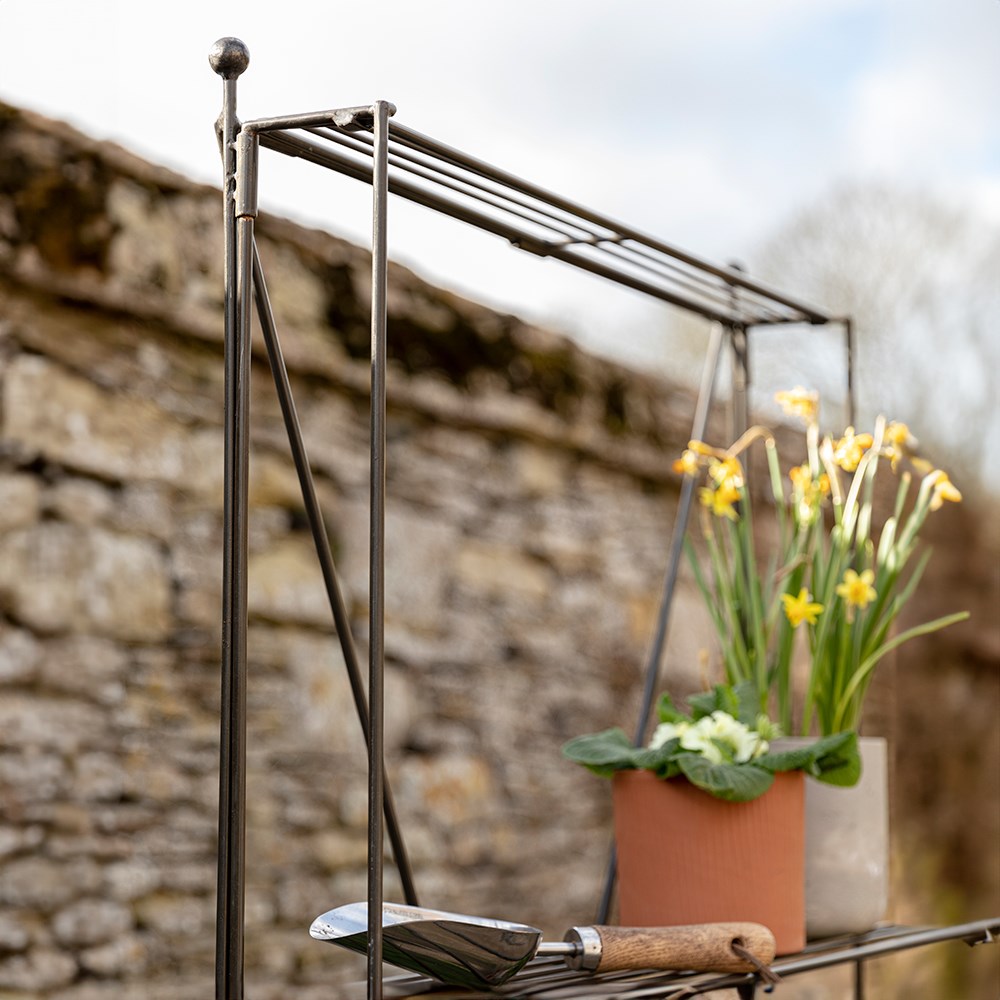 Tall steel plant stand