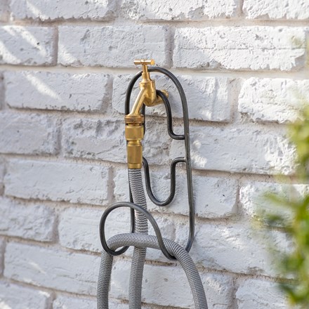 Tap hanging hose tidy