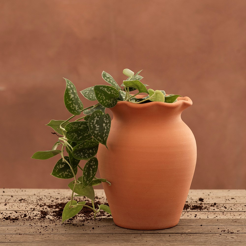 Terracotta ruffle vase with glazed interior