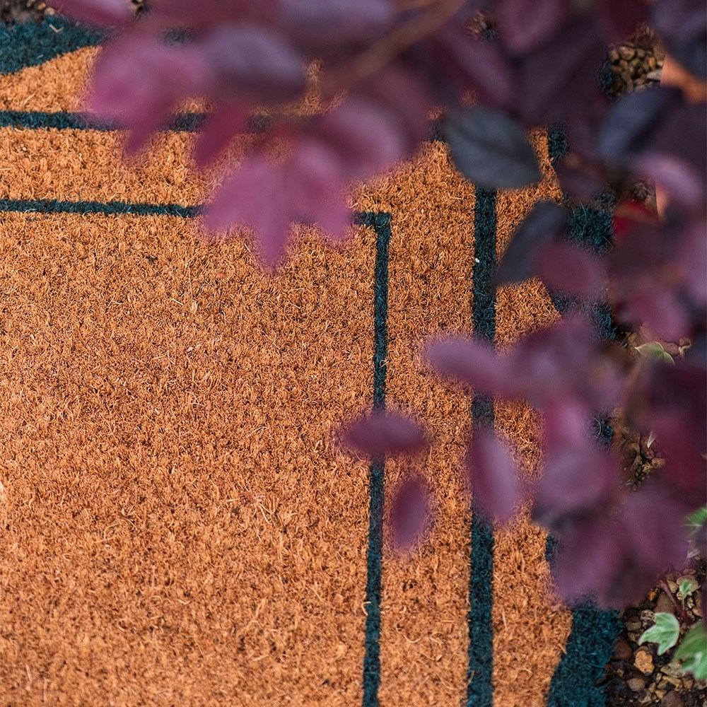 Scallop edge coir doormat