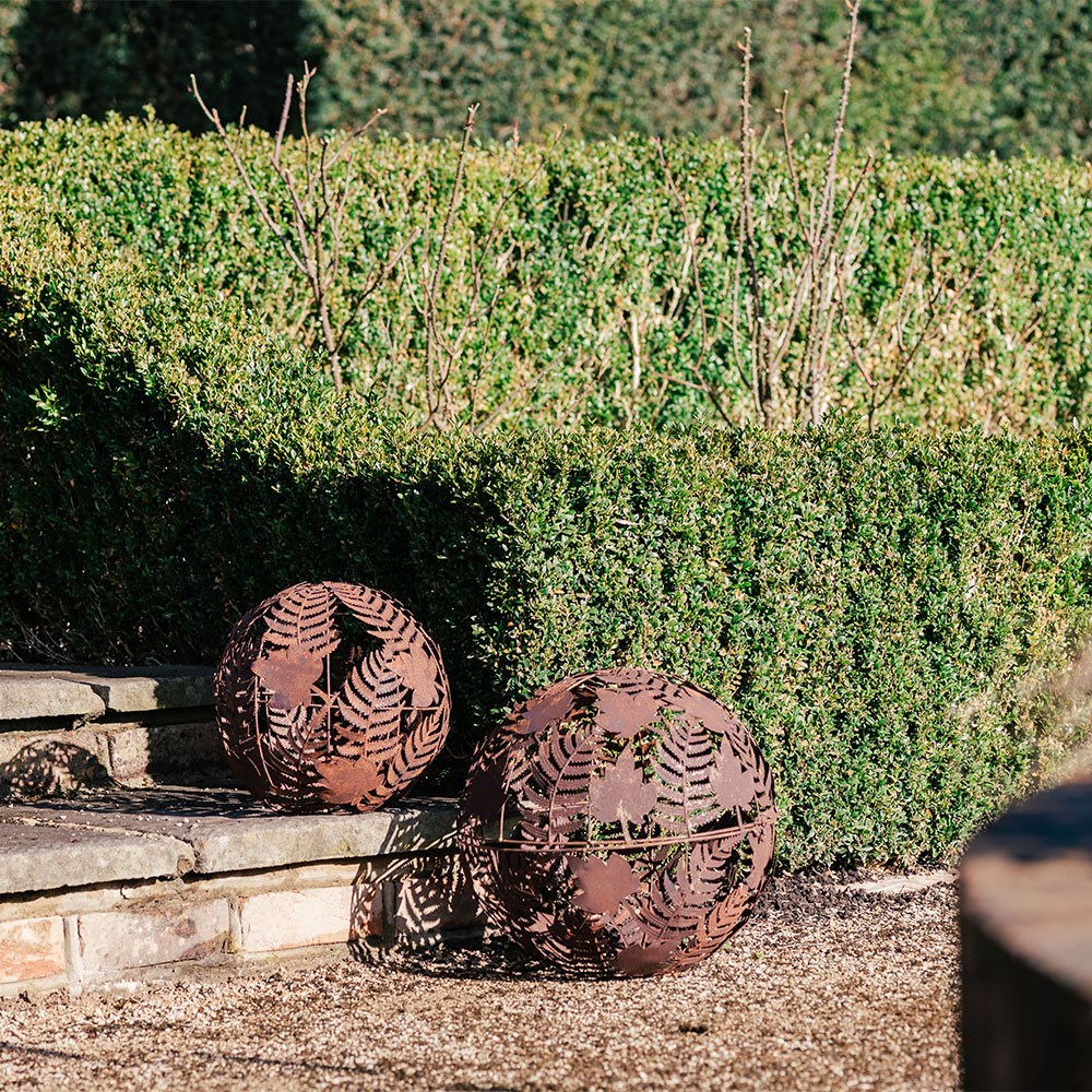 Set of two rusted leaf spheres