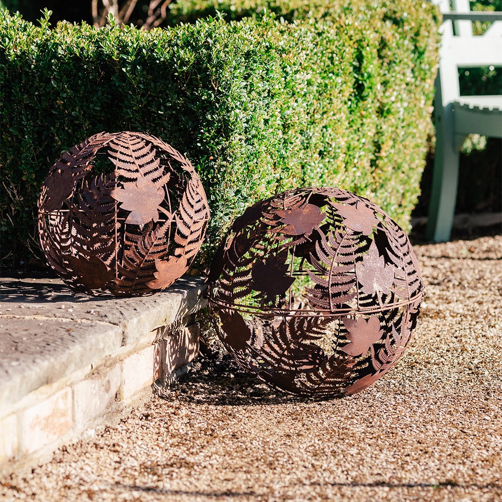 Set of two rusted leaf spheres