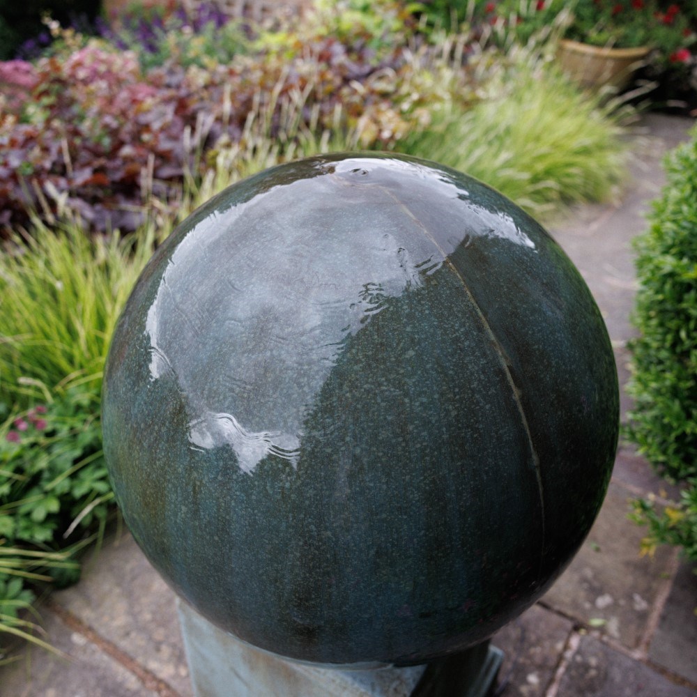 Large stone finish ball water feature