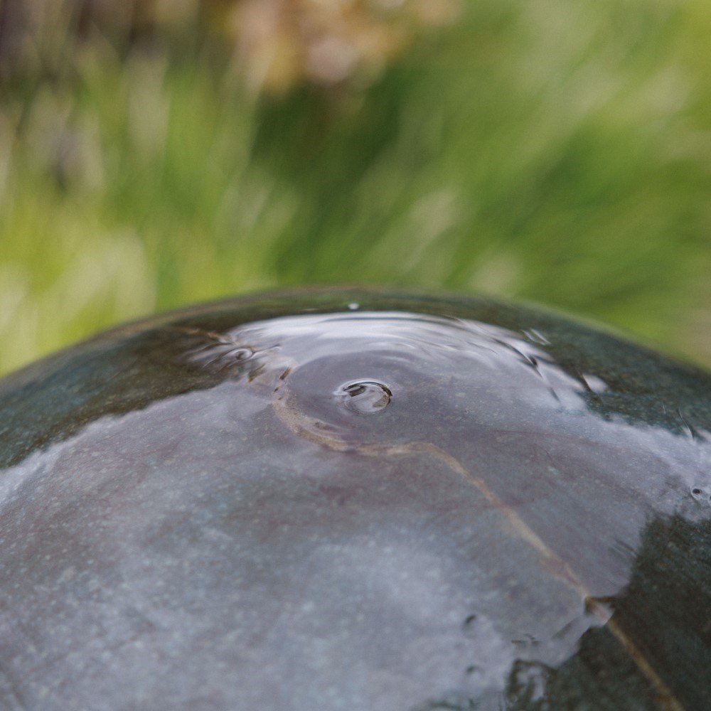 Large stone finish ball water feature