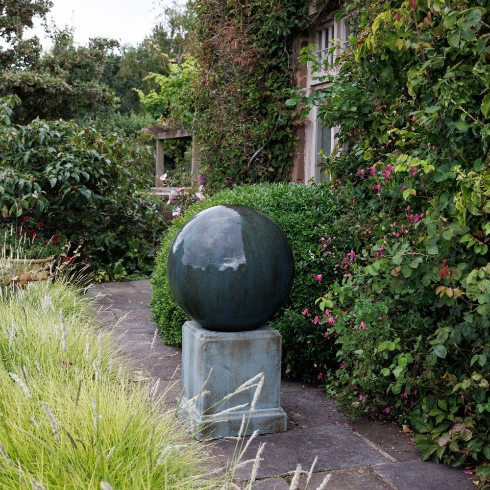Large stone finish ball water feature