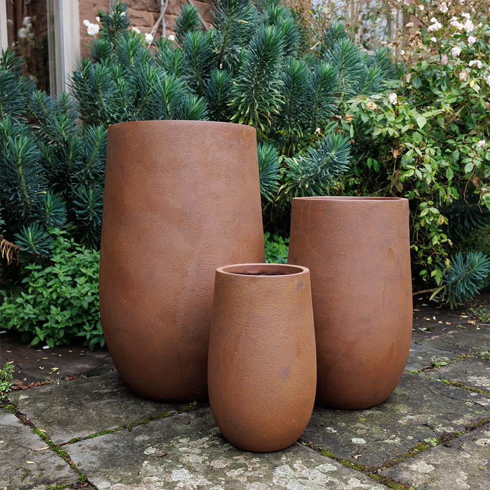 Set of three column planters in rust brown