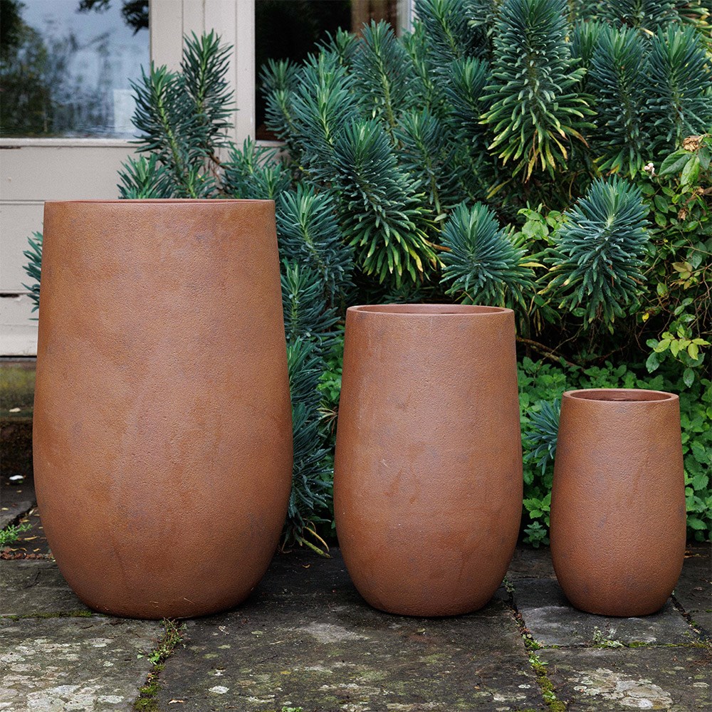 Set of three column planters in rust brown