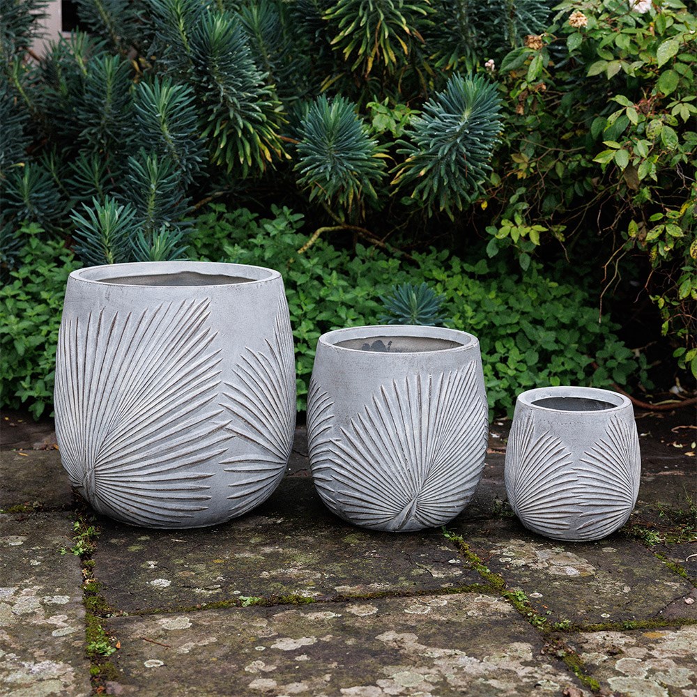 Set of three grey planters with leaf design