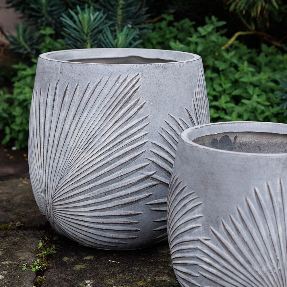 Set of three grey planters with leaf design