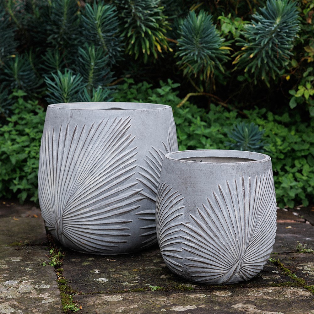 Set of three grey planters with leaf design