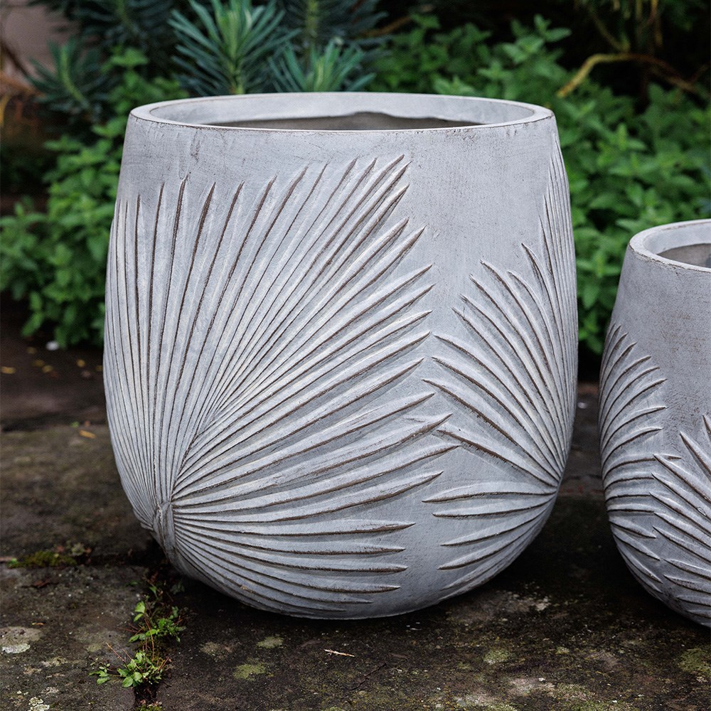 Set of three grey planters with leaf design
