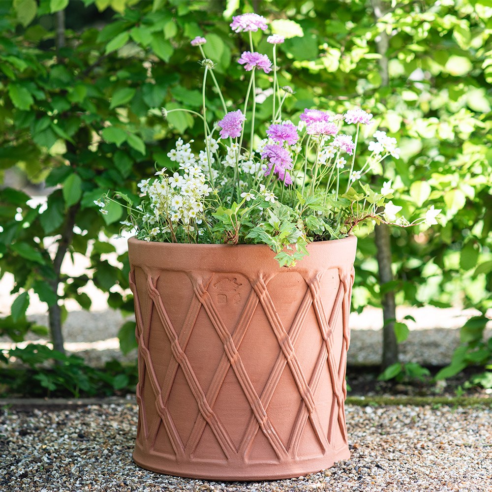 Terracotta basket barrel pot