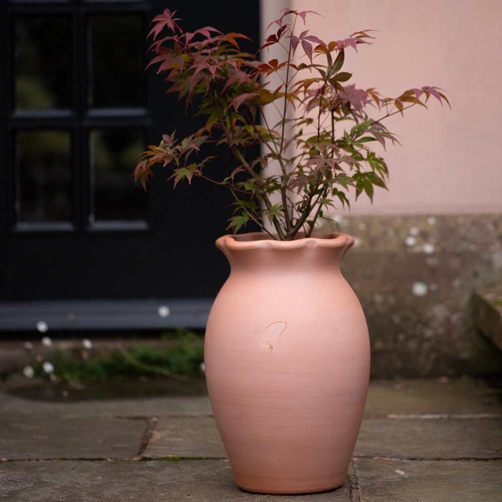 Terracotta ruffle vase pot