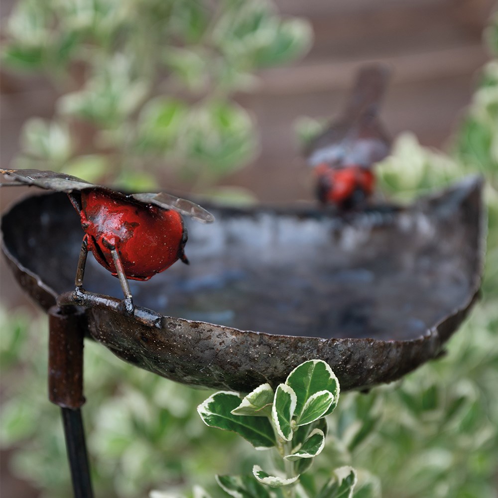 Leaf bird feeder on stake