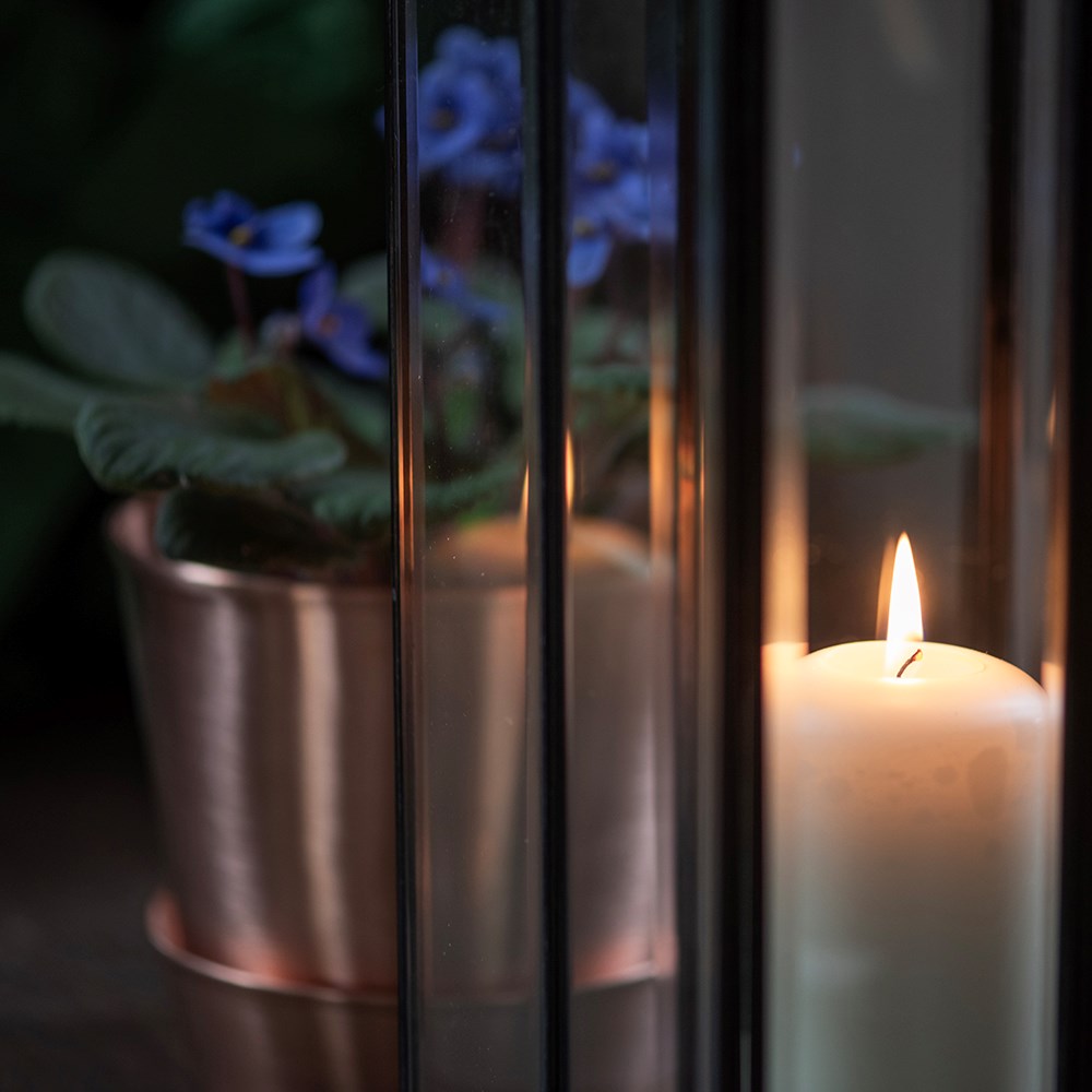 Bevelled glass candle holder