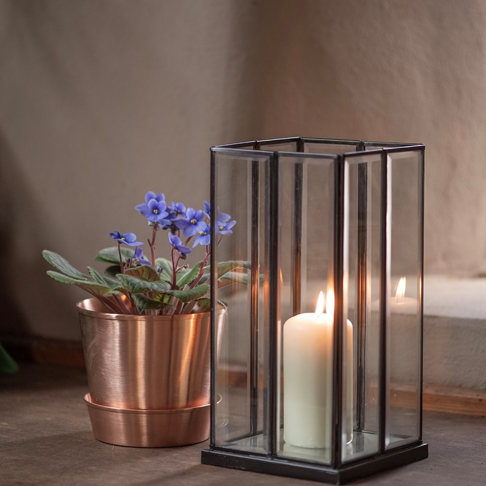 Bevelled glass candle holder