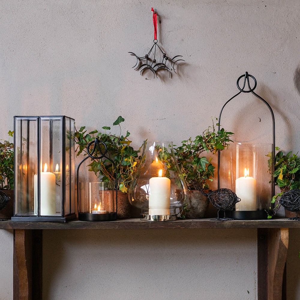 Bevelled glass candle holder