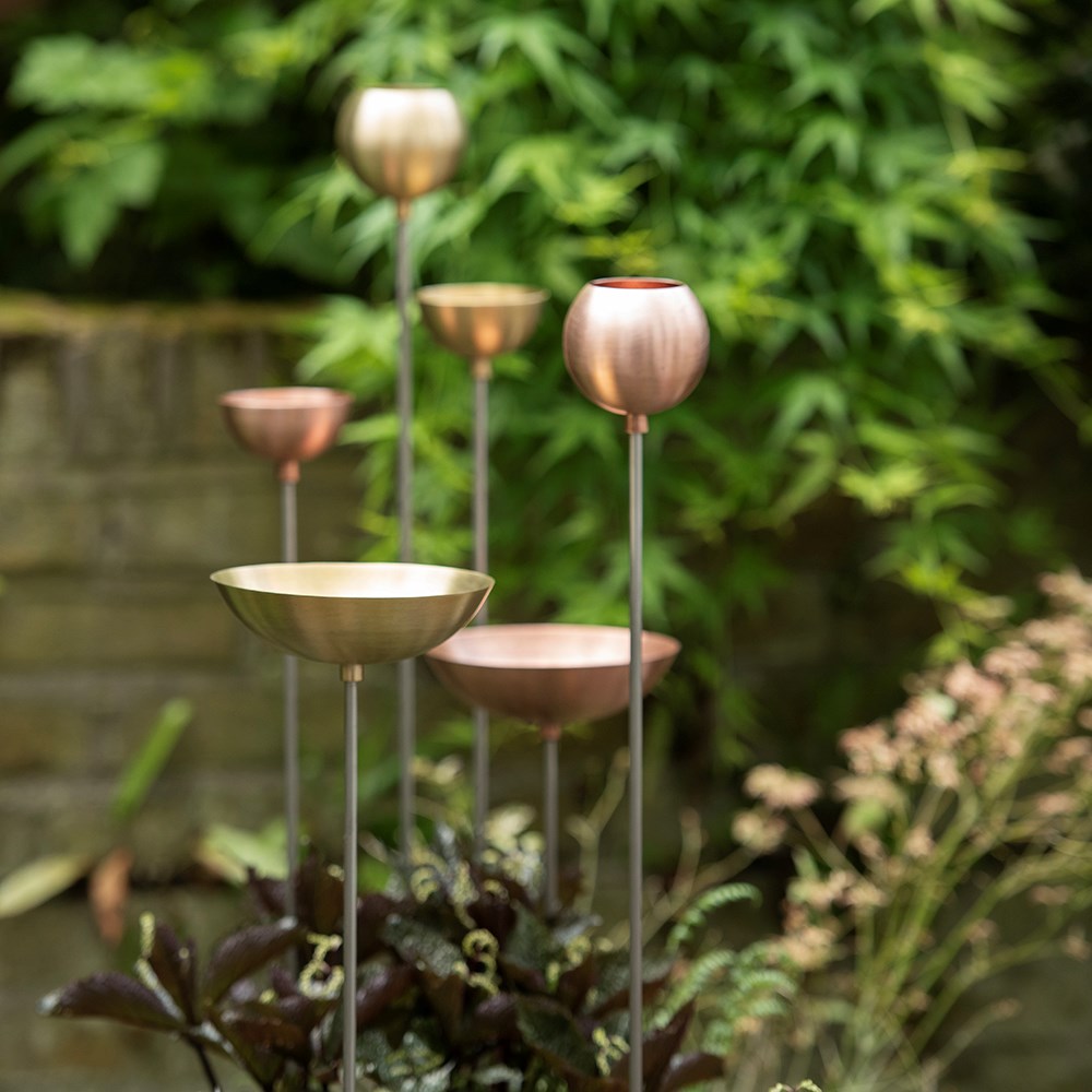 Copper bowl on stainless steel stake