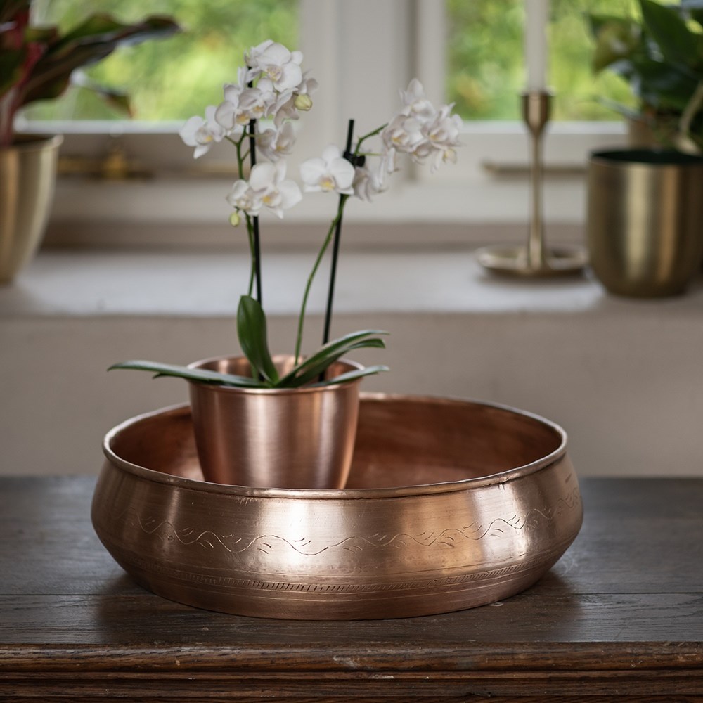 Traditionally etched copper bowl