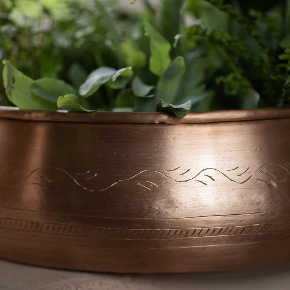 Traditionally etched copper bowl
