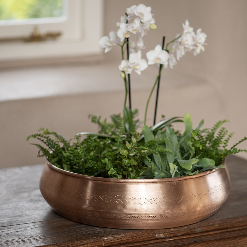 Traditionally etched copper bowl