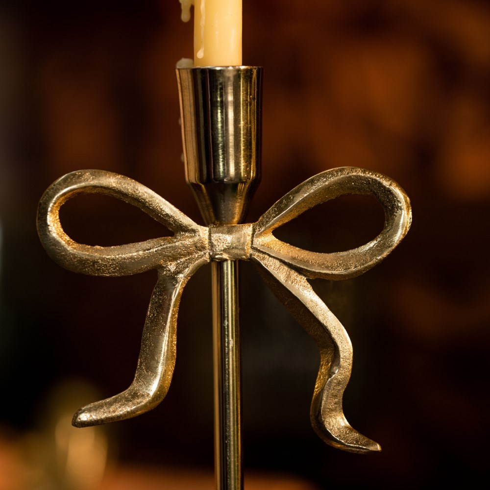 Gold bow candle holder