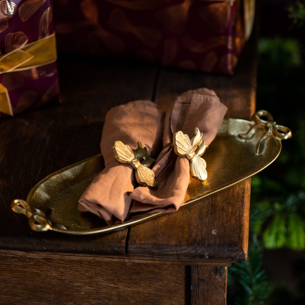Gold bow napkin ring