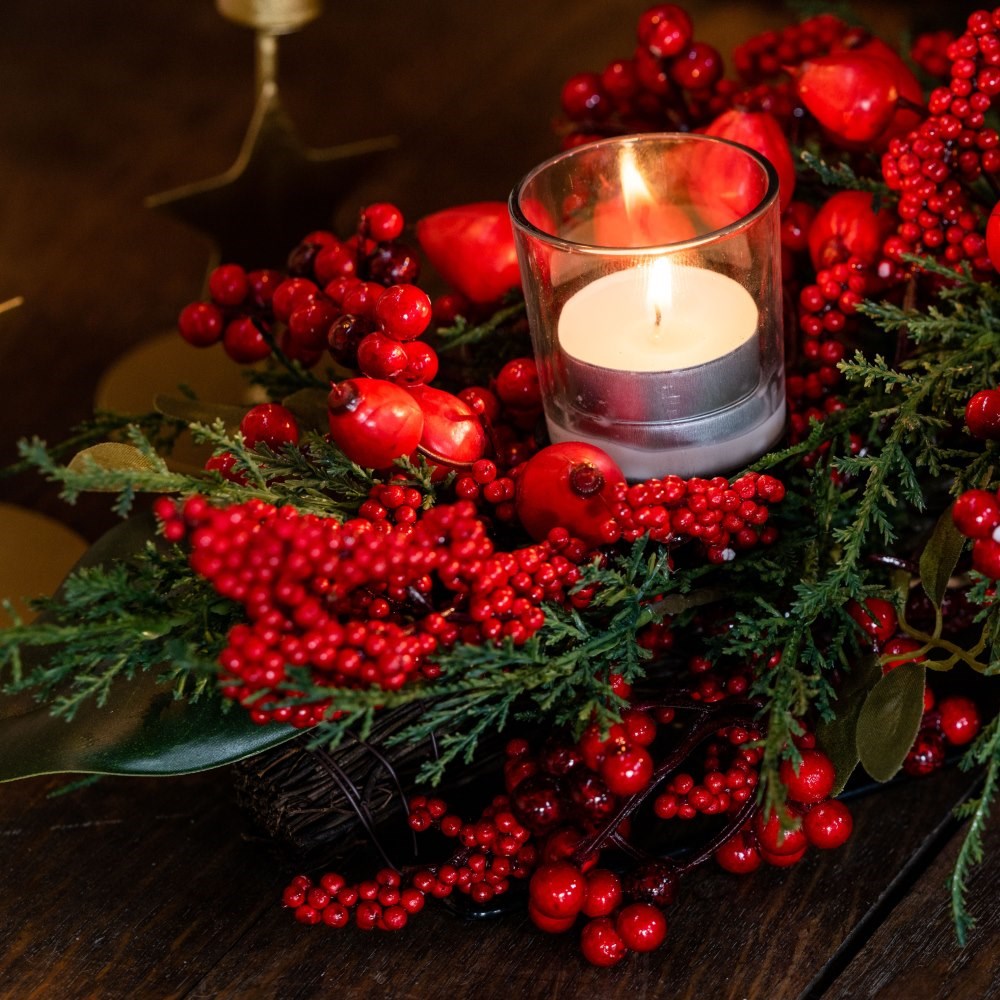 Opulent red berry and foliage centrepiece